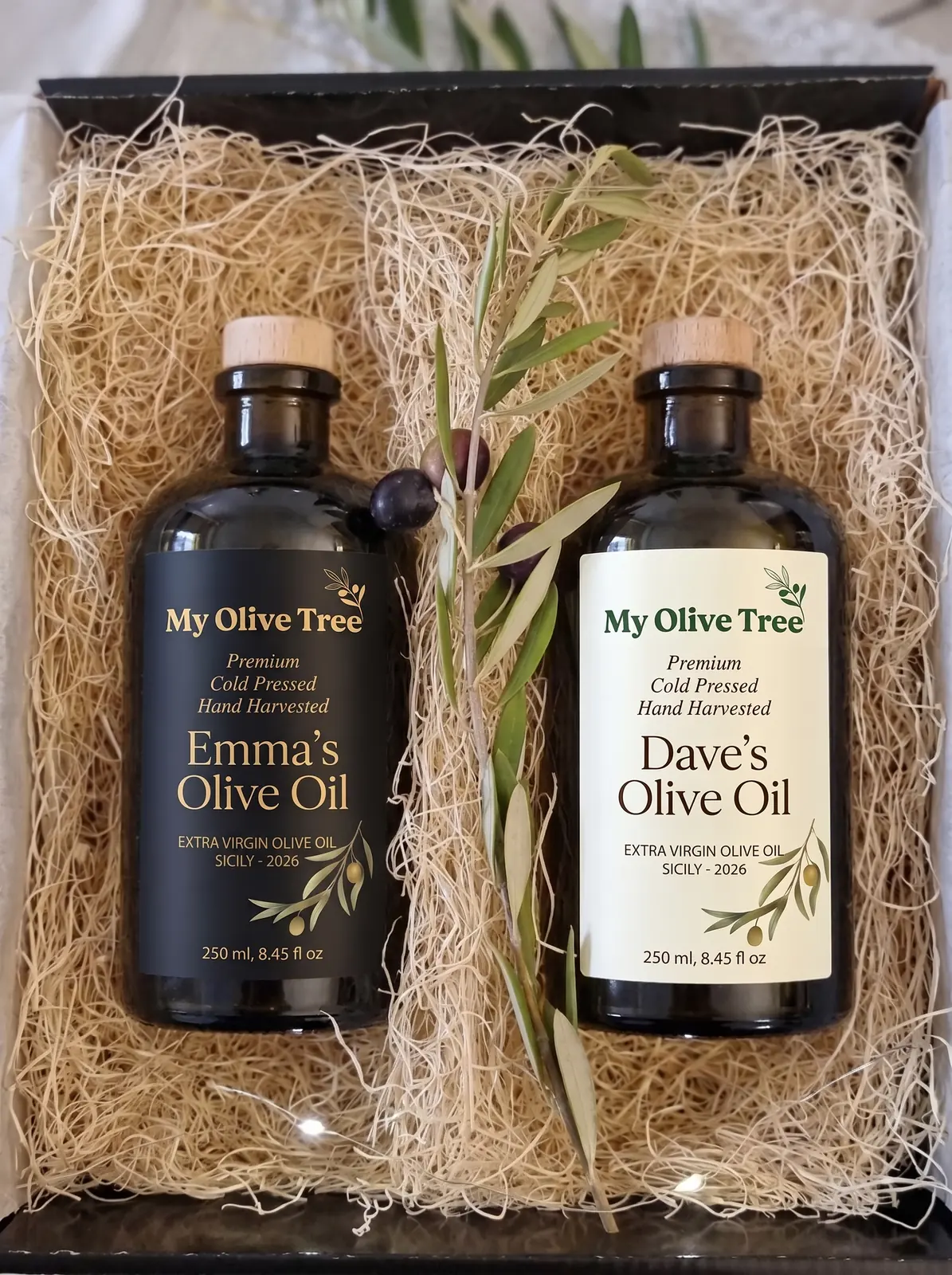 Two personalized MyOliveTree oil bottles in a gift box
